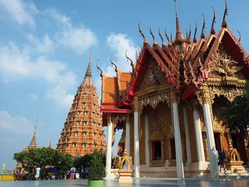 Low angle view of temple against building