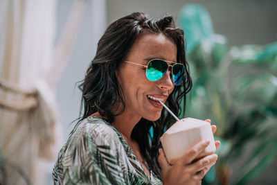 Portrait of woman wearing sunglasses