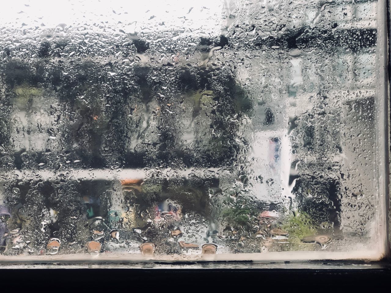 WATER SPLASHING THROUGH GLASS WINDOW