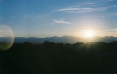 Scenic view of landscape against sky during sunset