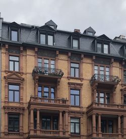 Low angle view of residential building against sky