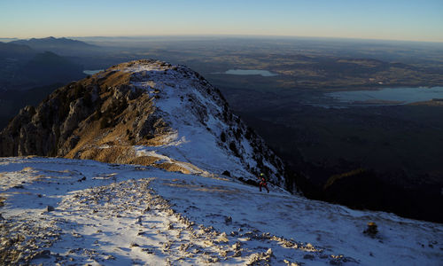 Scenic view of mountains against sky during winter