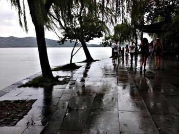 View of people walking on footpath