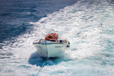 Boat sailing in sea