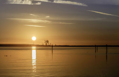 Scenic view of sea against sky during sunset