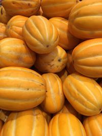 Full frame shot of honeydew melons at market for sale