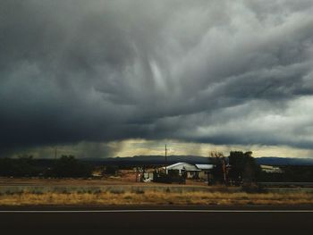 Landscape against cloudy sky
