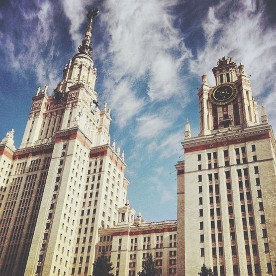 architecture, building exterior, built structure, low angle view, sky, religion, place of worship, church, spirituality, cathedral, famous place, travel destinations, history, tower, cloud - sky, tourism, clock tower, city