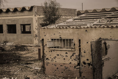 Abandoned building against sky