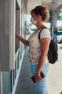 Full length of woman standing outdoors