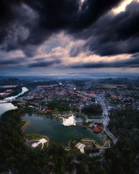 High angle view of buildings and city against sky