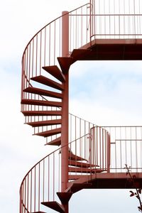 Low angle view of spiral staircase against sky
