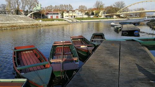 Boats moored at harbor