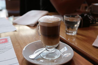 Close-up of coffee served on table