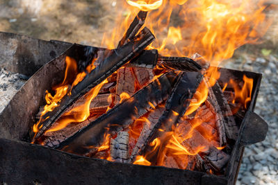 Close-up of fire on barbecue grill