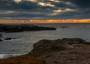 Scenic view of sea against sky during sunset