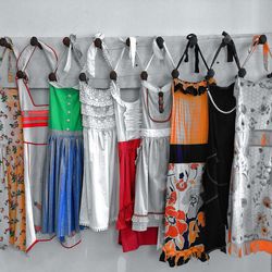 Close-up of multi colored clothes hanging on clothesline