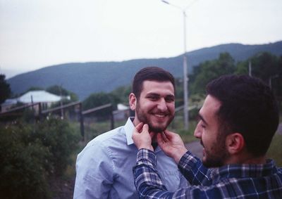 Portrait of young man and woman in mountains