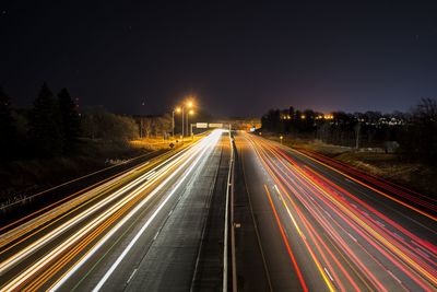 Light trails on road at night