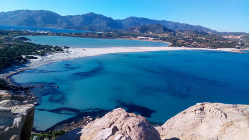 Panoramic view of sea against blue sky