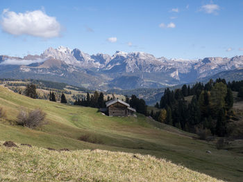 Scenic view of field against sky at seiser alm