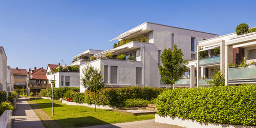 Low angle view of building against clear blue sky