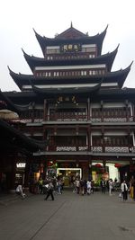 Group of people in front of building