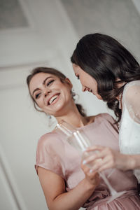 Portrait of smiling young woman