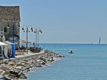 Scenic view of sea against blue sky