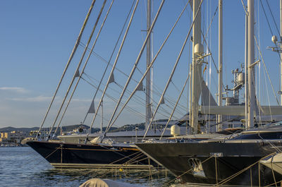 Boats moored at harbor