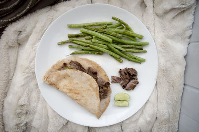 High angle view of breakfast served on table