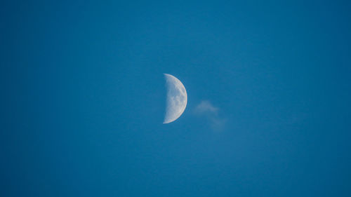 Low angle view of moon in sky