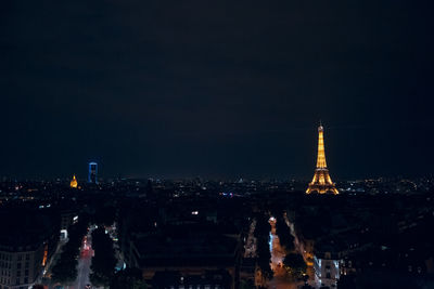 Illuminated buildings in city at night