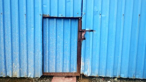 Corrugated iron door at construction site