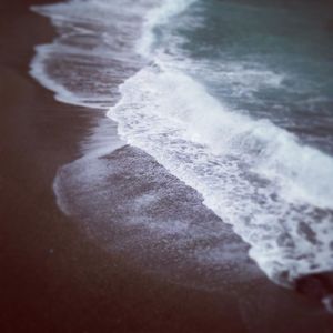 Close-up of wave on beach