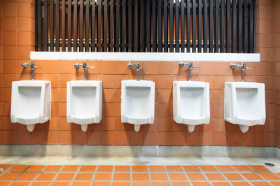 Row of chairs on tiled floor