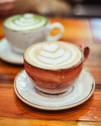 Close-up of cappuccino on table