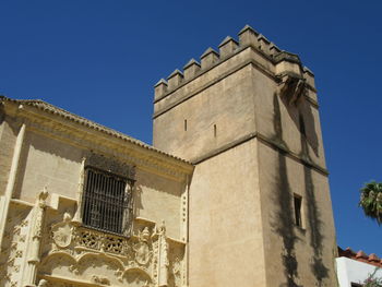 Low angle view of historic building against clear sky