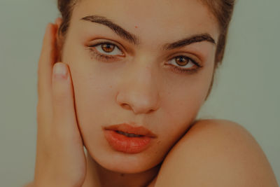 Close-up portrait of young woman