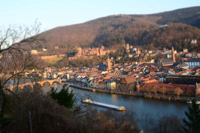 High angle view of river amidst buildings in city