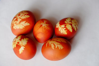 Close-up of easter eggs against white background