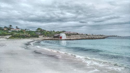 Scenic view of beach against sky