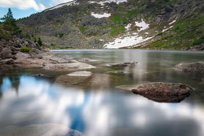 Scenic view of lake against mountain