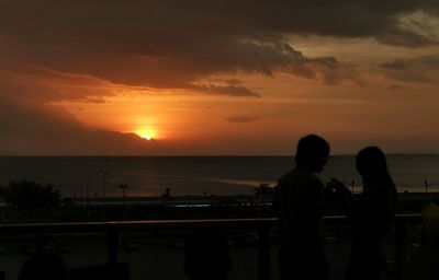 Scenic view of sea at sunset