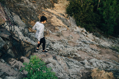 High angle view of female athlete descending hill