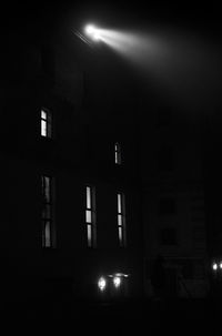 Low angle view of illuminated building at night