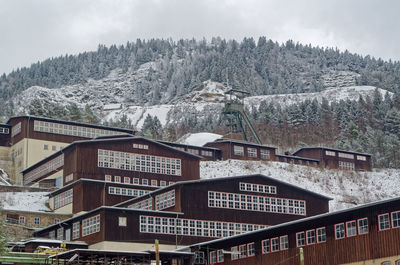 Scenic view of snow covered mountains against sky