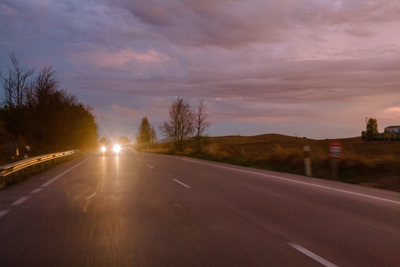 VIEW OF ROAD AT SUNSET