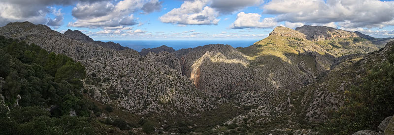 Panoramic view of landscape and mountains against sky