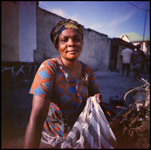 Portrait of smiling woman standing outdoors